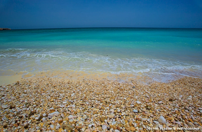 Pebble beach, Oman